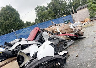 Car hoods, fender and more in gated area