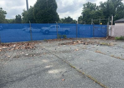 Gated area with car parts disposed