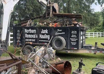Filling a trailer with yard waste
